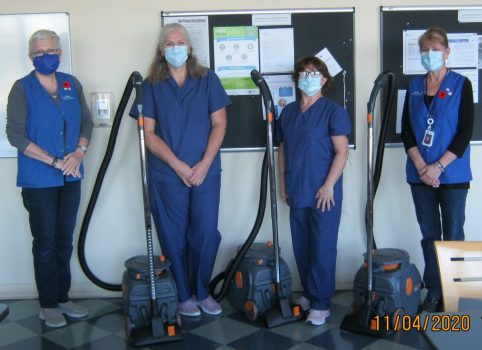 Photo of Brightshores staff and new vacuums